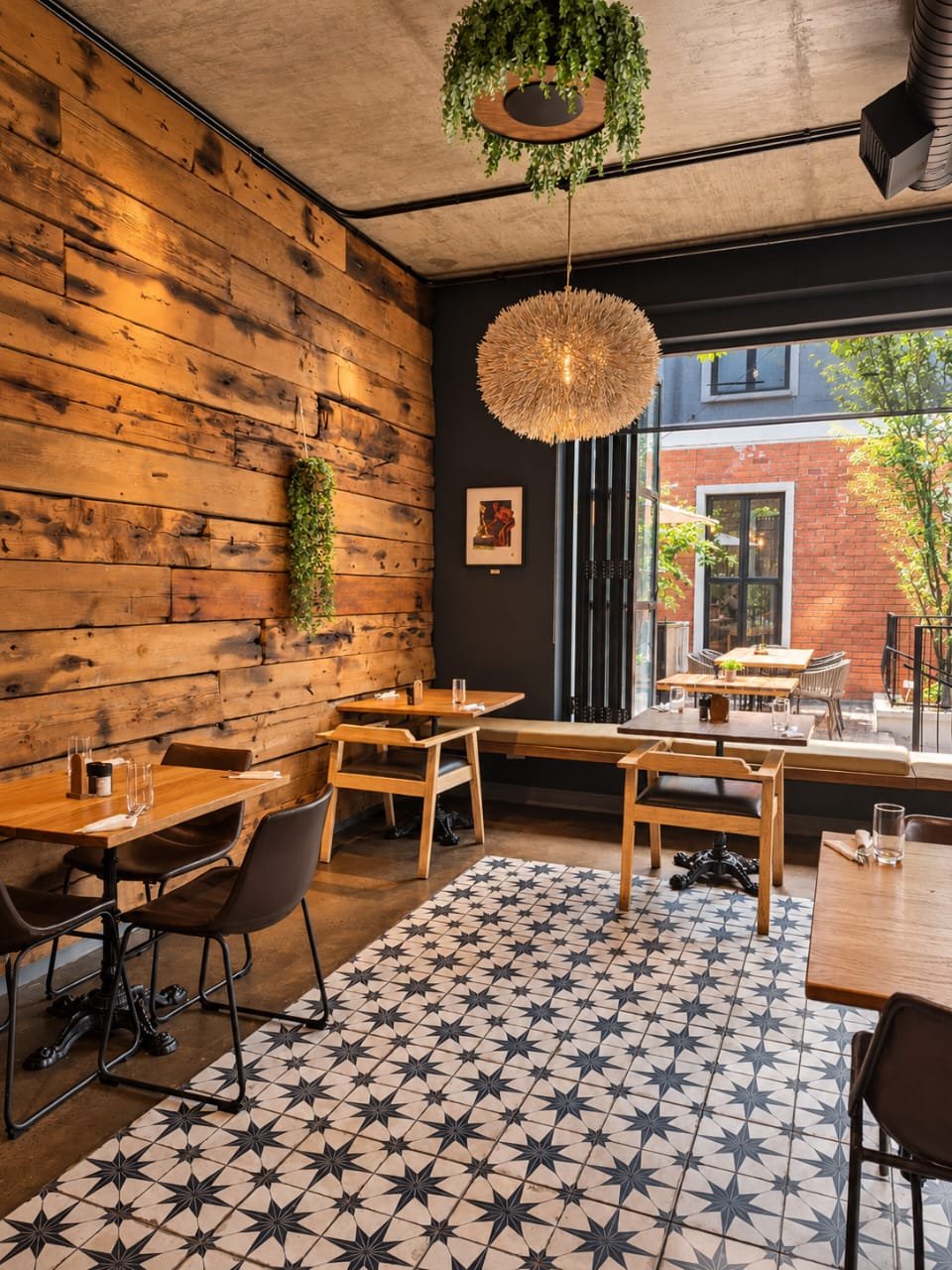 Timber wall and courtyard view at Olivia’s Kitchen, Am Weinberg
